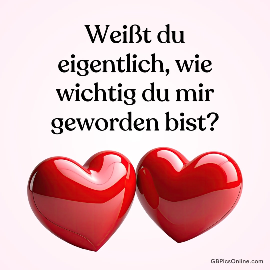 Text „Weißt du eigentlich, wie wichtig du mir geworden bist?“ über zwei glänzenden roten Herzen