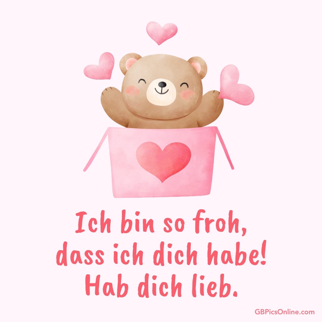 Ein Bär in einer Box mit Herzen und den Worten: „Ich bin so froh, dass ich dich habe! Hab dich lieb.“