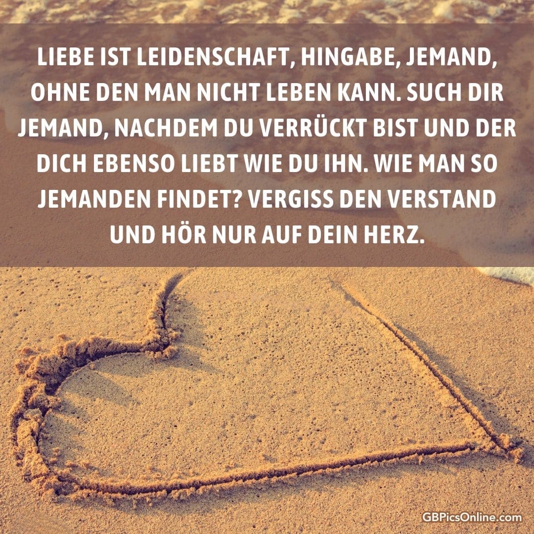 Ein Herz im Sand mit Liebeszitat