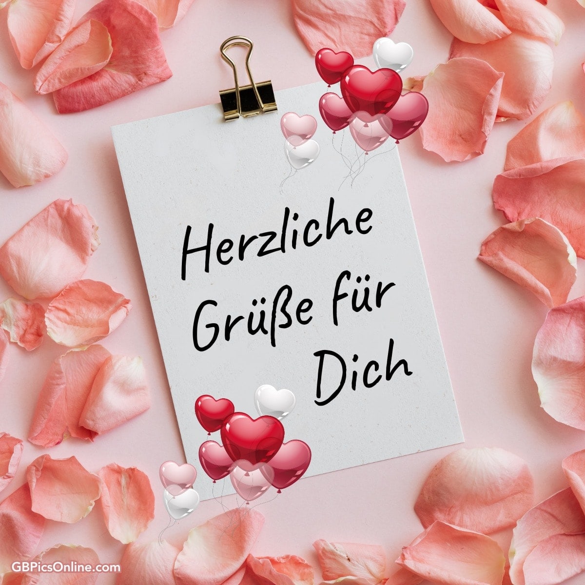 Notizzettel mit „Herzliche Grüße für Dich“, umgeben von Rosenblättern und Ballons in Herzform