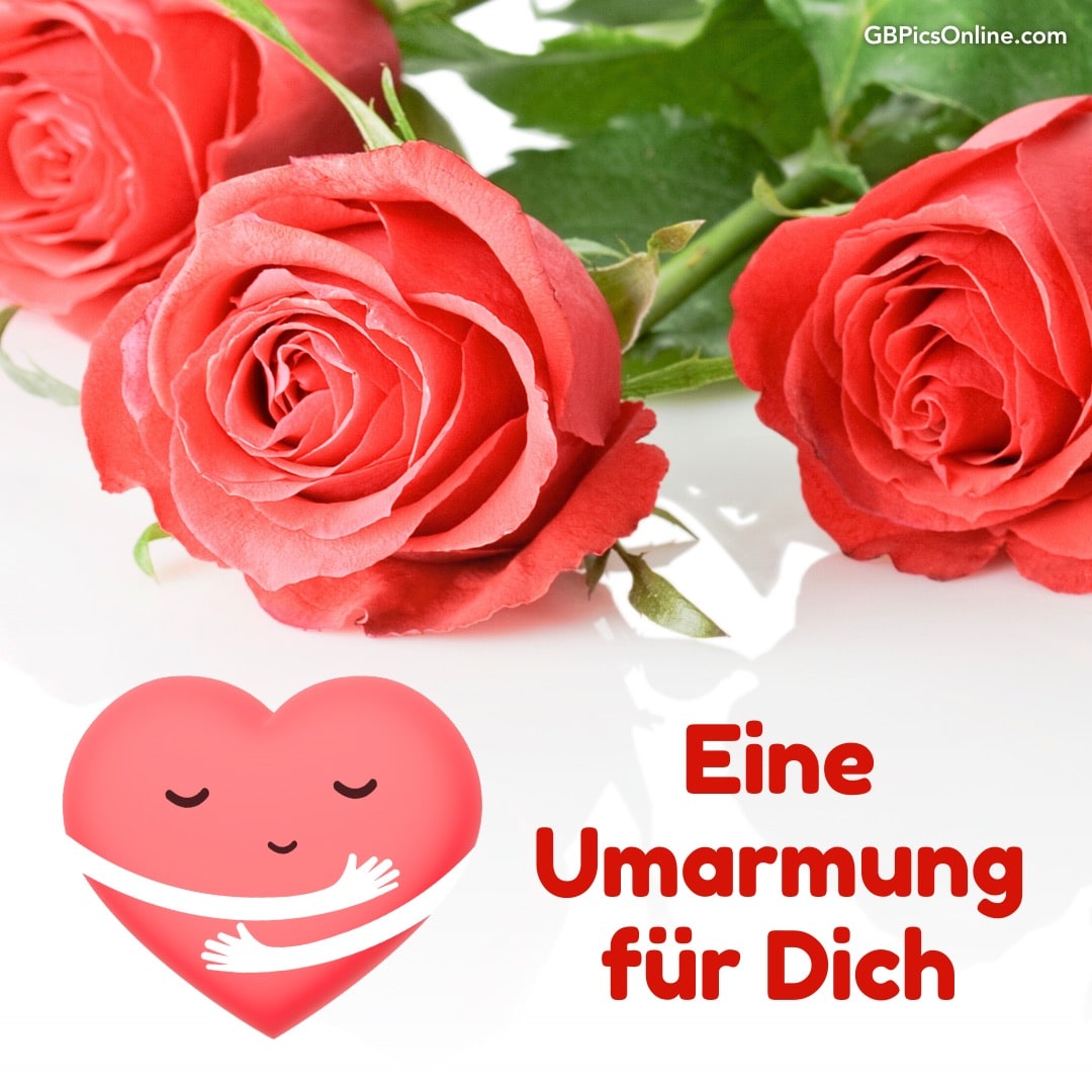 Drei rote Rosen und ein herzliches „Eine Umarmung für Dich“ mit einem lächelnden Herz