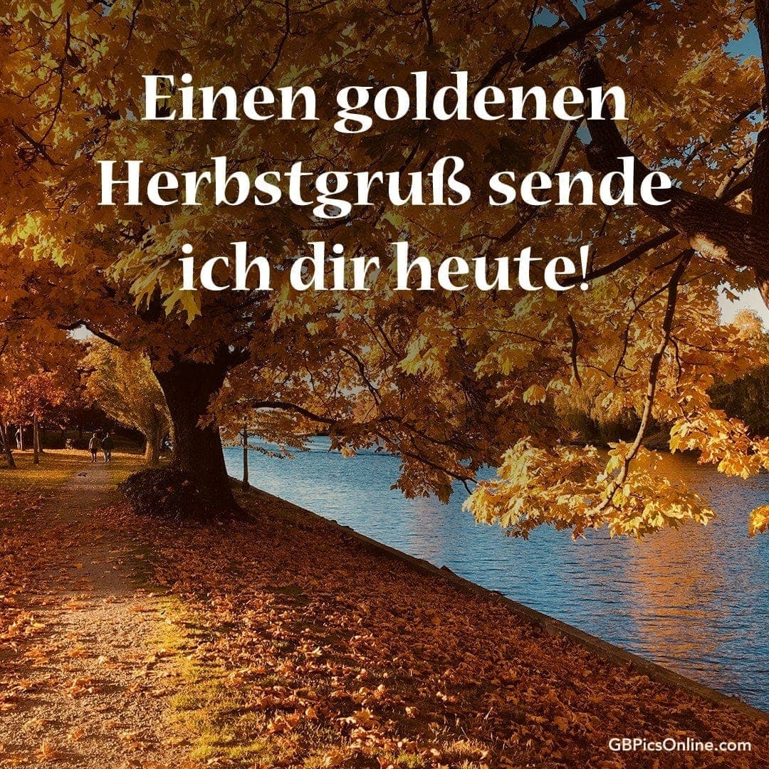 Goldene Herbstblätter am See, dazu Grußtext „Einen goldenen Herbstgruß sende ich dir heute!“
