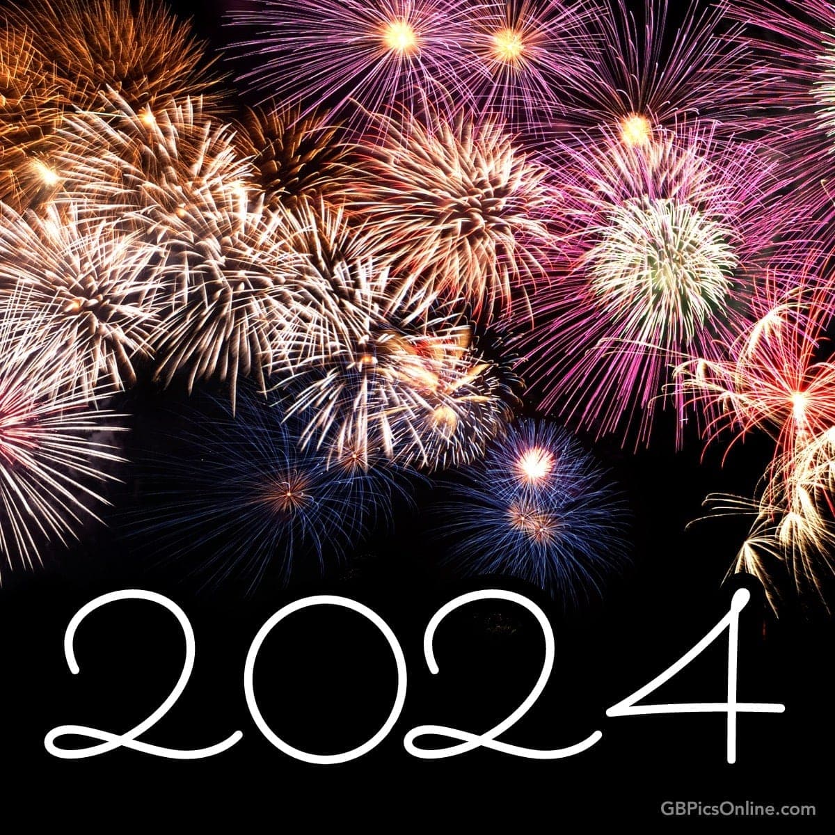 Buntes Feuerwerk am Himmel mit der Zahl 2024 in Weiß