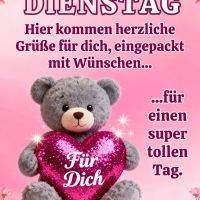 Grauer Teddybär hält glitzerndes Herz mit „Für dich“, rosa Hintergrund mit Blüten und Dienstag-Grüßen