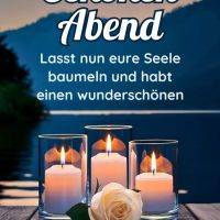 Kerzen und eine Rose vor einem See bei Sonnenuntergang mit Text für einen schönen Dienstagabend