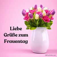 Farbenfrohe Tulpen in einer weißen Vase als Zeichen der Wertschätzung und Freude.