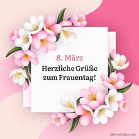 Blühende Grüße und Wünsche für einen schönen Frauentag, umrahmt von zarten Frühlingsblumen.