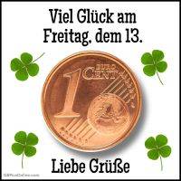 1-Cent-Münze mit Kleeblättern und dem Spruch „Viel Glück am Freitag, dem 13. Liebe Grüße.“