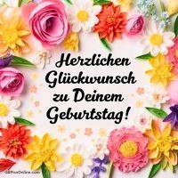 Bunte Blumenbordüre mit Geburtstagsgruß in der Mitte
