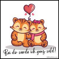 Zwei süße, verliebte Tiger, die sich neben einem Herzballon umarmen. Text: Bei dir werde ich ganz wild!