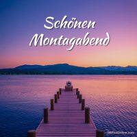 Steg führt in einen ruhigen See bei Sonnenuntergang, darüber Grußtext