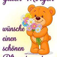 Niedlicher Teddybär hält einen bunten Blumenstrauß; lila Grußtext zum Pfingstmontag