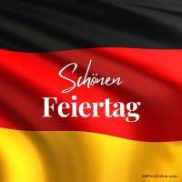Welliges Deutschlandflaggenmotiv mit Grußtext „Schönen Feiertag“